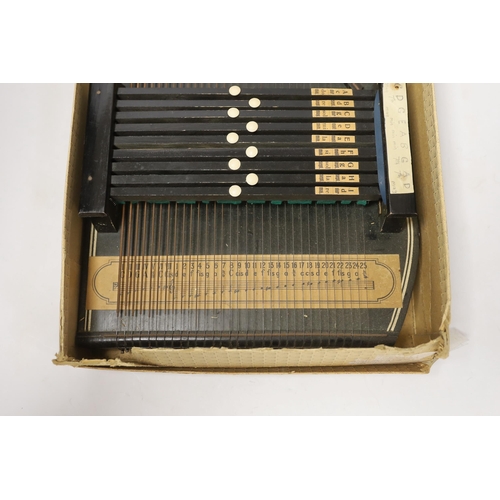 1386 - An autoharp in original box with booklet