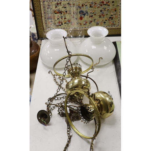 1404 - A pair of brass hanging lights with opaque glass shades