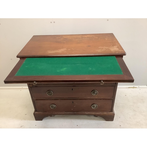 104 - A small early 19th century four drawer mahogany chest with brushing slide, width 83cm, depth 47cm, h... 