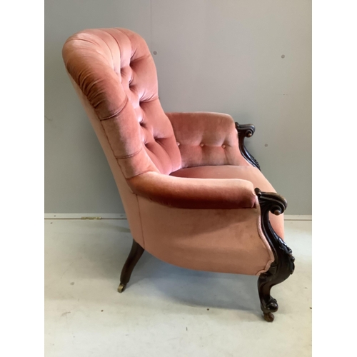 111 - A Victorian mahogany upholstered spoon back armchair, width 70cm, depth 70cm, height 100cm