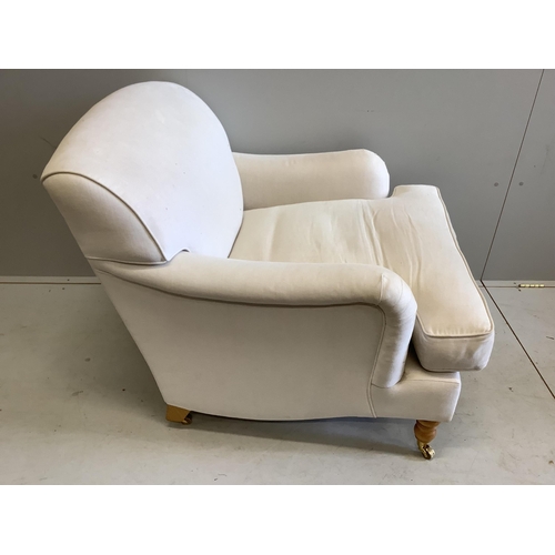 119 - A Contemporary Howard style upholstered armchair, width 88cm, depth 94cm, height 82cm