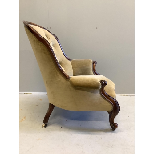 136 - A Victorian walnut upholstered spoonback armchair, width 75cm, depth 80cm, height 94cm