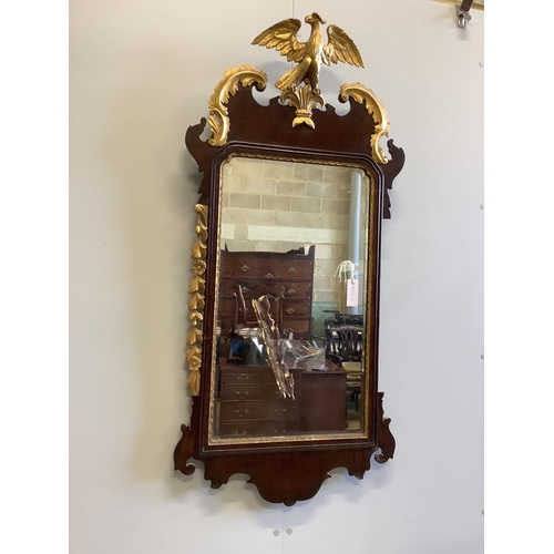 14 - An early 19th century Chippendale design mahogany and parcel gilt fret carved pier glass, having car... 