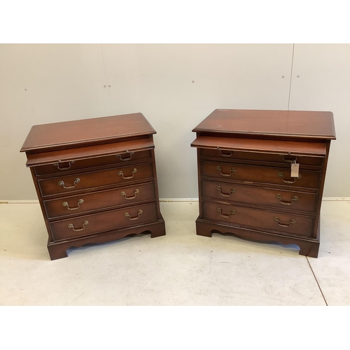 145 - A pair of Georgian style mahogany bedside chests, each fitted four drawers and a slide, on square br... 