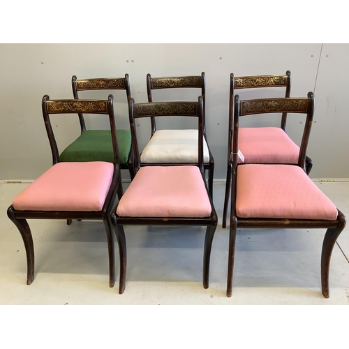 172 - A set of six Regency rosewood and simulated rosewood dining chairs, the top rails inlaid with cut br... 