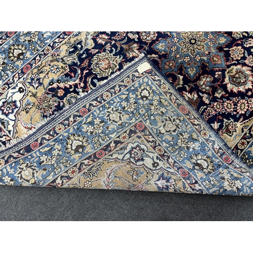 180 - A North West Persian blue ground carpet, 270 x 158cm