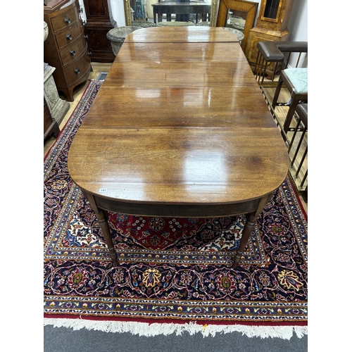 183 - A Regency mahogany D end extending dining table, 257cm extended, width 109cm, height 70cm