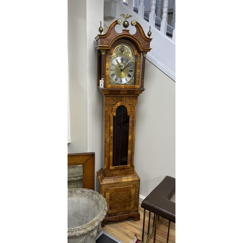 189 - A reproduction yew Westminster chiming longcase clock, marked Keith Buxton, height 212cm