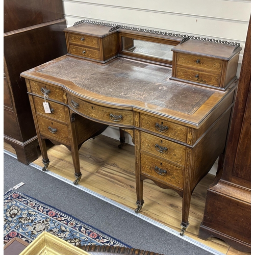 201 - An Edwardian marquetry inlaid rosewood bow front kneehole desk, width 114cm, depth 62cm, height 93cm... 