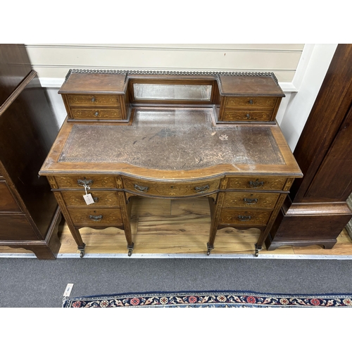 201 - An Edwardian marquetry inlaid rosewood bow front kneehole desk, width 114cm, depth 62cm, height 93cm... 