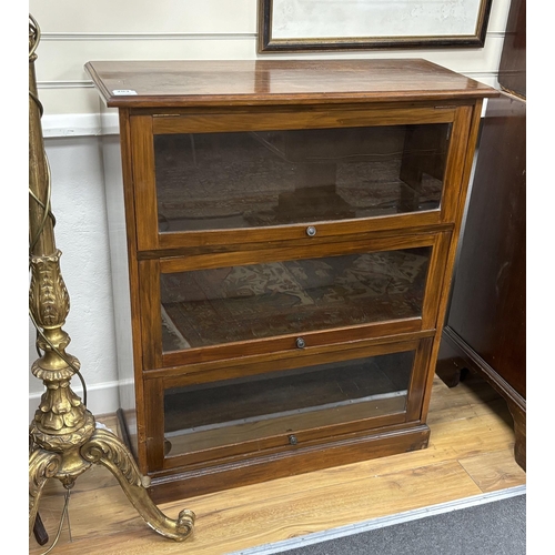 203 - A glazed mahogany three door bookcase, width 82cm, depth 34cm, height 99cm