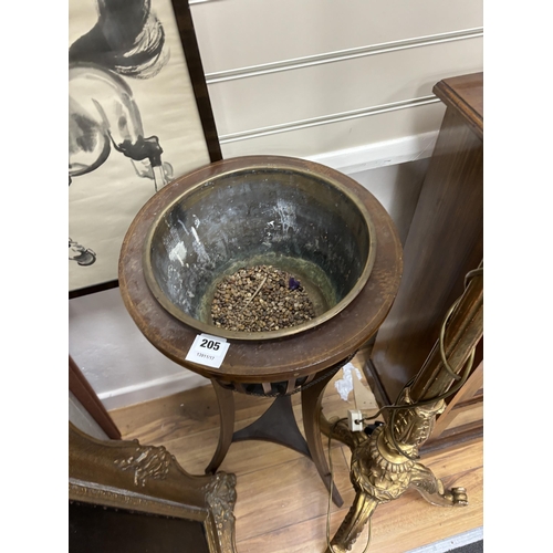 205 - An Edwardian inlaid mahogany jardiniere with brass liner, diameter 37cm, height 93cm