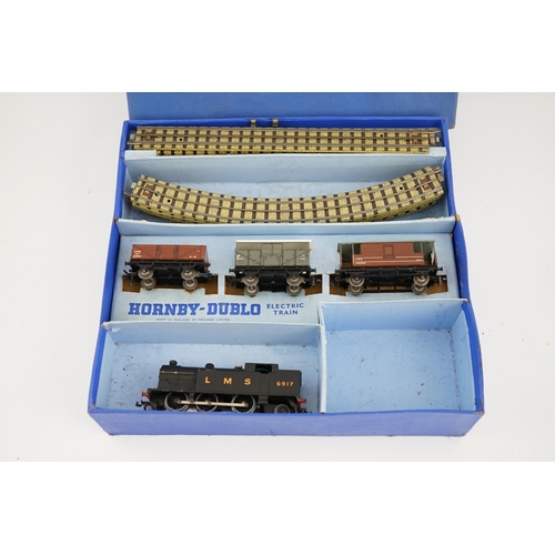 251 - A collection of Hornby Dublo railway for 3-rail running, including; a boxed EDG7 Tank Goods Train se... 