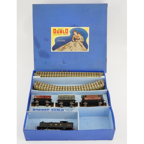 251 - A collection of Hornby Dublo railway for 3-rail running, including; a boxed EDG7 Tank Goods Train se... 