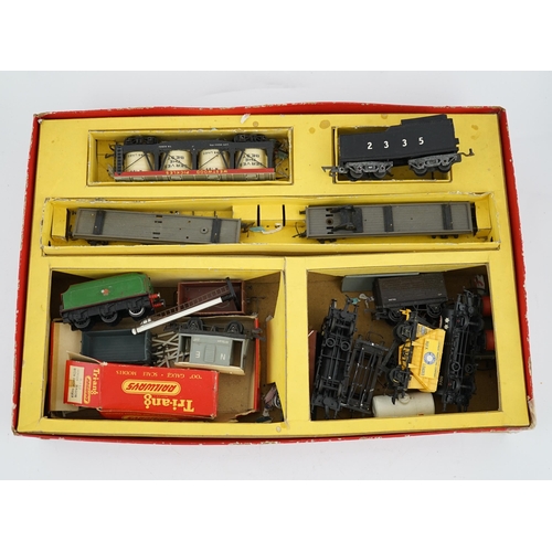 253 - A collection of Tri-ang Railways 00 gauge model railway items, including; four locomotives, US outli... 