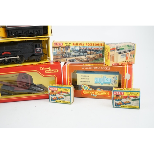 261 - A collection of mostly Tri-ang Railways 00 gauge model railway, including three locomotives; a BR sa... 