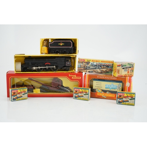 261 - A collection of mostly Tri-ang Railways 00 gauge model railway, including three locomotives; a BR sa... 