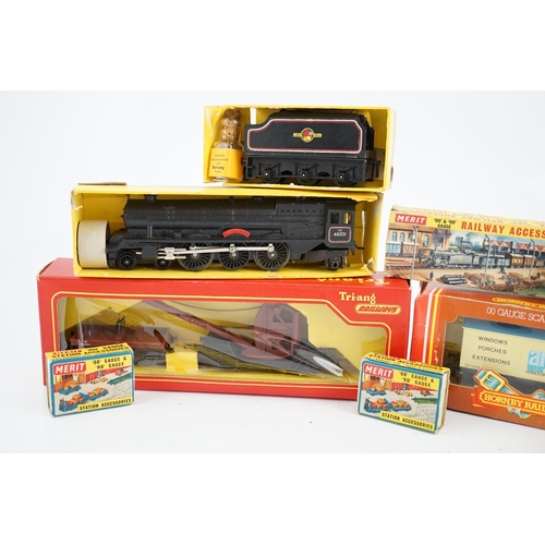 261 - A collection of mostly Tri-ang Railways 00 gauge model railway, including three locomotives; a BR sa... 