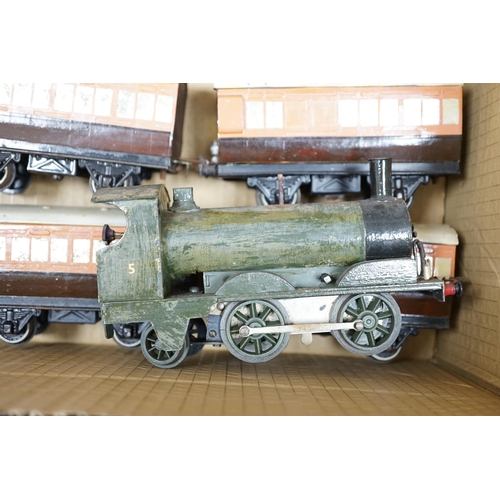 266 - Fifteen tinplate 0 gauge railway items, including three clockwork locomotives; an LSWR 0-4-2 tender ... 