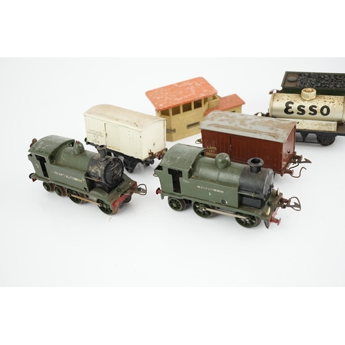 268 - Fourteen 0 gauge tinplate etc. railway items, including three clockwork locomotives; an LSWR 4-4-0 t... 