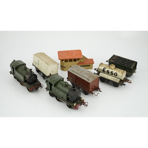 268 - Fourteen 0 gauge tinplate etc. railway items, including three clockwork locomotives; an LSWR 4-4-0 t... 