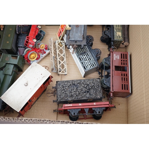 268 - Fourteen 0 gauge tinplate etc. railway items, including three clockwork locomotives; an LSWR 4-4-0 t... 