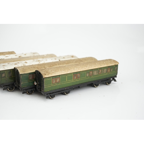 269 - Six Hornby 0 gauge tinplate No.2 coaches in Southern Railway livery, one coach adapted to a driving ... 