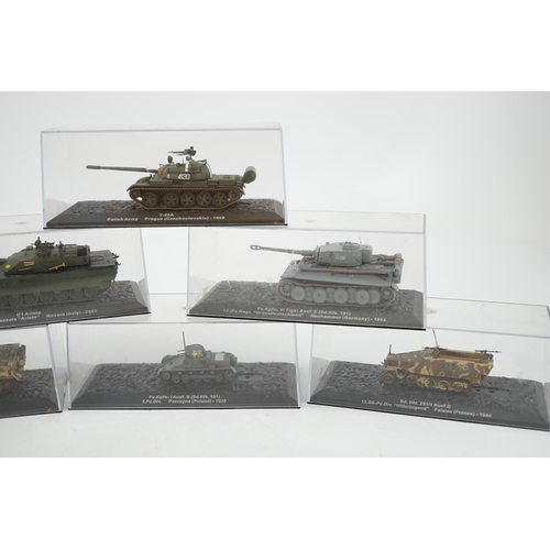 299 - Sixty-eight magazine issue military vehicles in plastic display cases, including; tanks, armoured ca... 