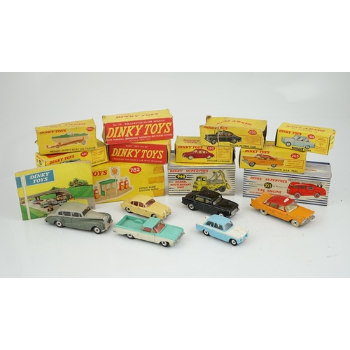 319 - Eleven boxed Dinky Toys; a Triumph Herald (189), a Plymouth U.S.A. Taxi (265), a Chevrolet El Camin... 