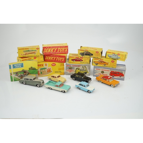 319 - Eleven boxed Dinky Toys; a Triumph Herald (189), a Plymouth U.S.A. Taxi (265), a Chevrolet El Camin... 