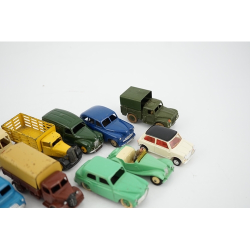 321 - Twelve Dinky Toys, including; Austin van, Vanguard, Market Gardeners wagon, Hillman Minx, MG Midget... 