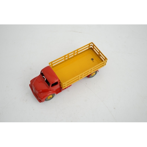 325 - A boxed Dinky Supertoys Leyland Comet Lorry (531), with red cab and chassis, yellow stake body and y... 