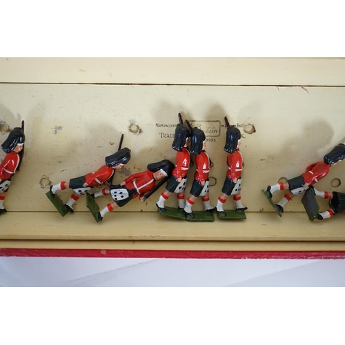 329 - A Britains Regiments Of All Nations series box of lead soldiers, including twelve Scottish Highlan... 