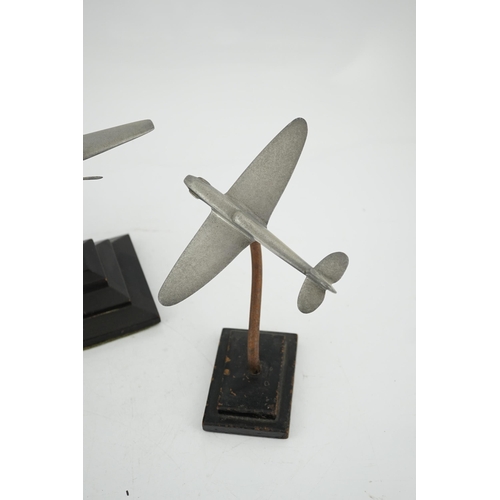 330 - Two cast aluminium military aircraft models mounted on stepped wooden bases; a Halifax bomber, wings... 