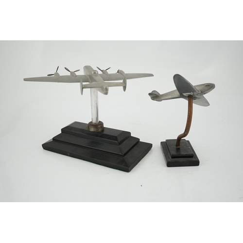 330 - Two cast aluminium military aircraft models mounted on stepped wooden bases; a Halifax bomber, wings... 