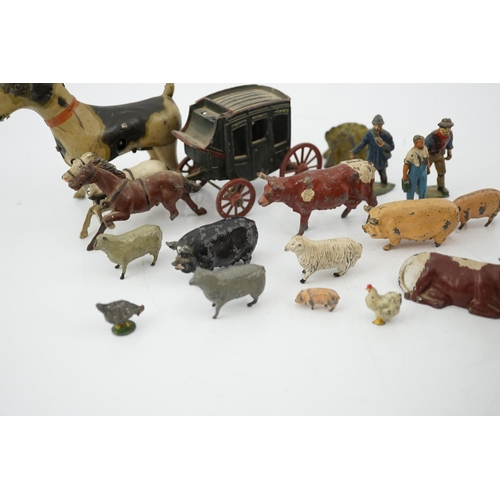 331 - A collection of Britains, etc. lead farm animals and accessories, including the farmer, farmers wif... 