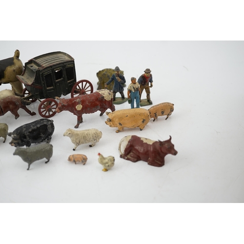 331 - A collection of Britains, etc. lead farm animals and accessories, including the farmer, farmers wif... 