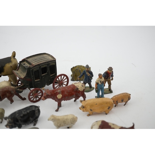 331 - A collection of Britains, etc. lead farm animals and accessories, including the farmer, farmers wif... 