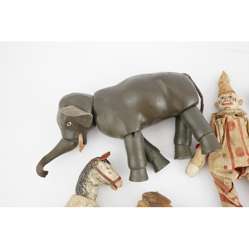 332 - A Schoenhut Humpty Dumpty Circus, early 20th century, including elephant, lion house and other piece... 