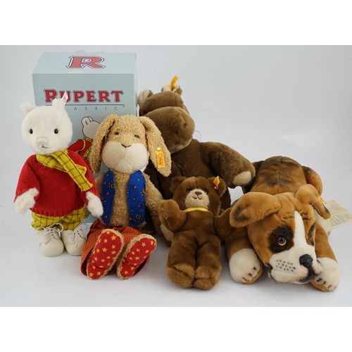 338 - Four Steiff toys including Boxer dog and Rupert Bear