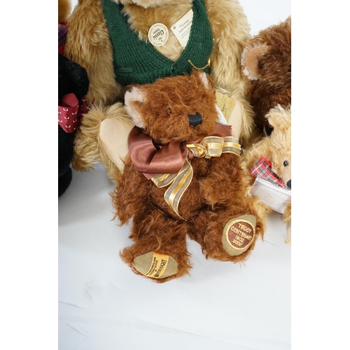 345 - A large 1906 Steiff orange label, two Merrythought John Lewis bears, a black Merrythought bear, an a... 