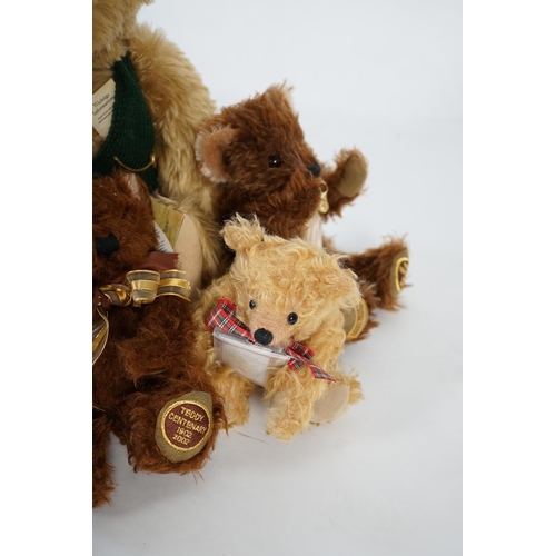 345 - A large 1906 Steiff orange label, two Merrythought John Lewis bears, a black Merrythought bear, an a... 