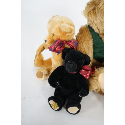 345 - A large 1906 Steiff orange label, two Merrythought John Lewis bears, a black Merrythought bear, an a... 