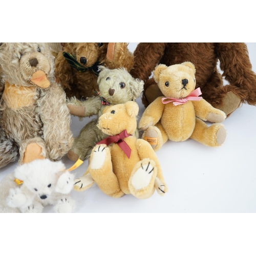 348 - A collection of twenty-six modern teddy bears by The English Teddy Bear Co., Honey Hill Bears, Merry... 