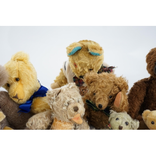 348 - A collection of twenty-six modern teddy bears by The English Teddy Bear Co., Honey Hill Bears, Merry... 