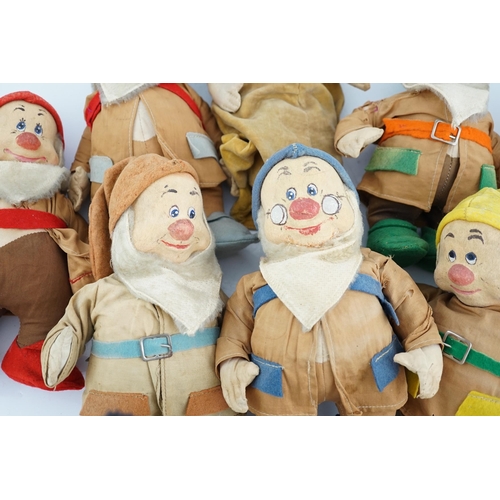 349 - A set of Merrythought Snow White and the Seven Dwarves, Snow White with Merrythought label to the so... 