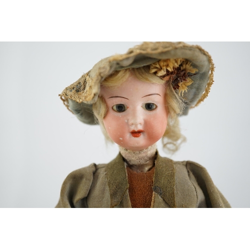 355 - A German automaton of a flower seller, 39cm high