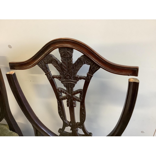 36 - Two Hepplewhite period mahogany dining chairs, a 19th century Sheraton design elbow chair, a pair of... 