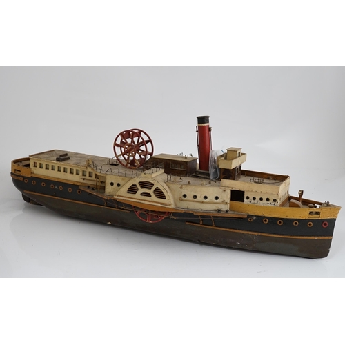 365 - A wooden model of a paddle steamer, with a well detailed deck and with some age to the model, howeve... 