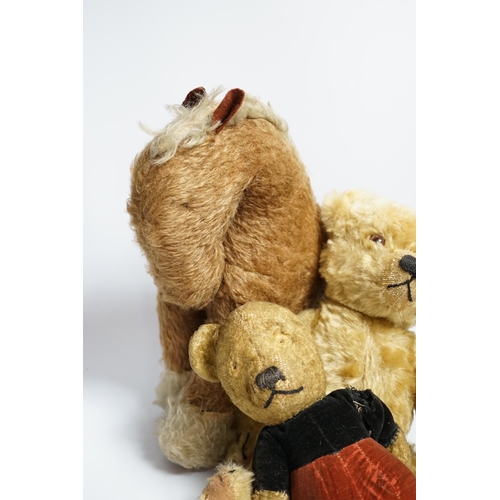 378 - A Chad Valley teddy bear, 34cm high, a smaller bear in velvet clothes and a Merrythought horse... 